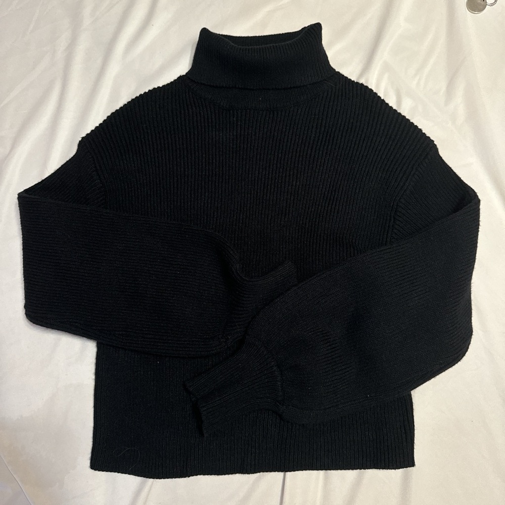 Francesca’s turtle neck sweater
